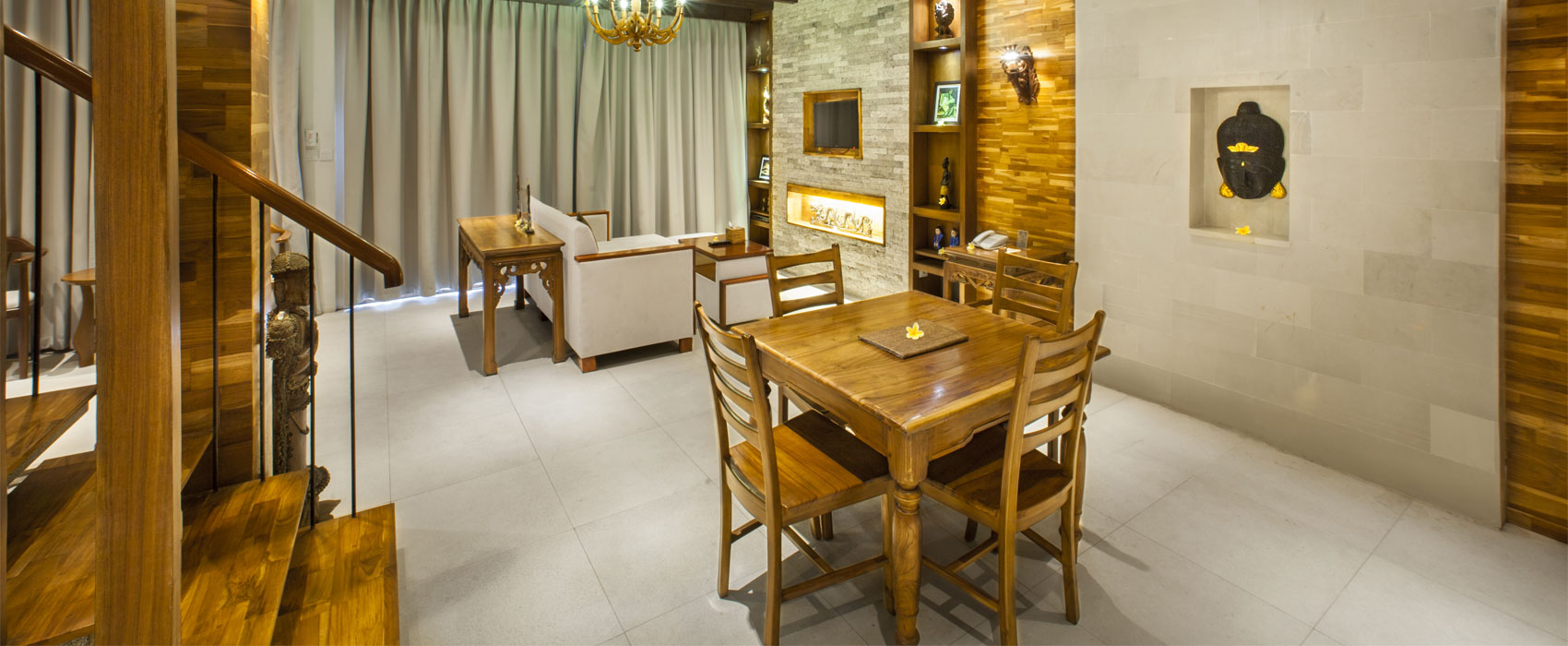 Spacious living and dining area in Arana Two Bedroom Garden Villa at Astagina Resort.