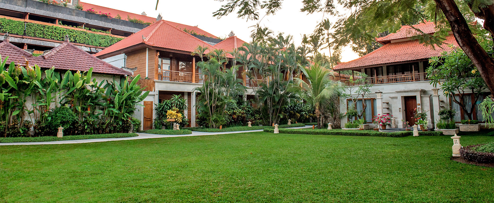 Lush and beautiful tropical garden landscape at Astagina Resort Villa and Spa Bali.