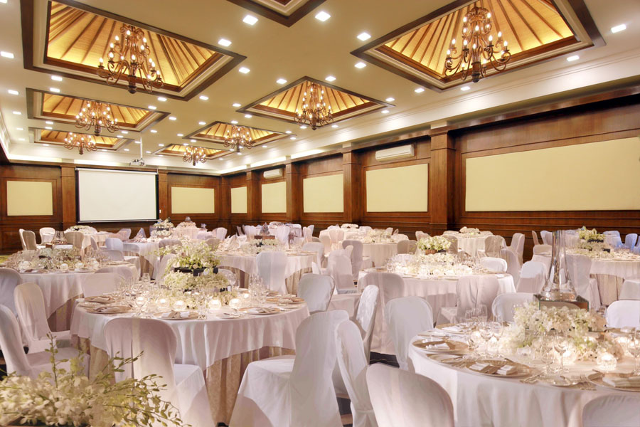 Elegant grand ballroom setup for a corporate event or formal dinner at Astagina Resort.