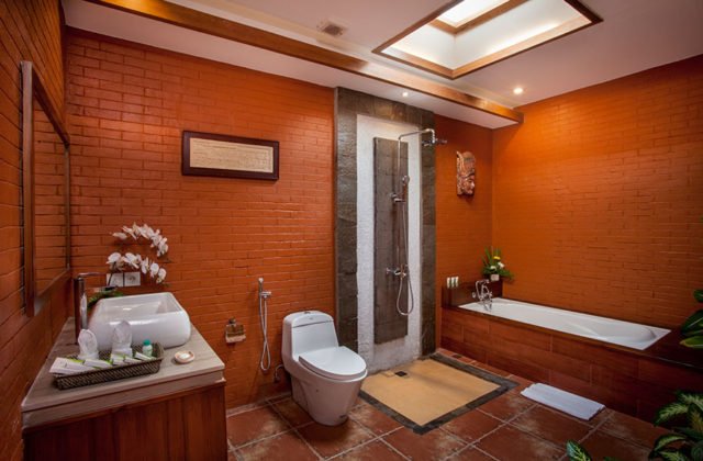 Modern en-suite bathroom facility with luxury amenities inside the one-bedroom accommodation at Astagina Resort.