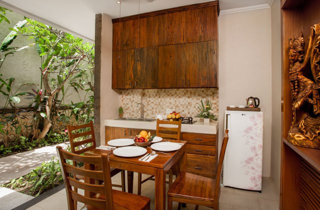 Exclusive private dining setup in a breezy, open-plan villa setting at Astagina Resort.