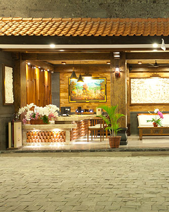 Warm and elegant front office reception desk at Astagina Resort.