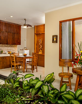 Modern villa kitchen and dining area at Astagina Resort