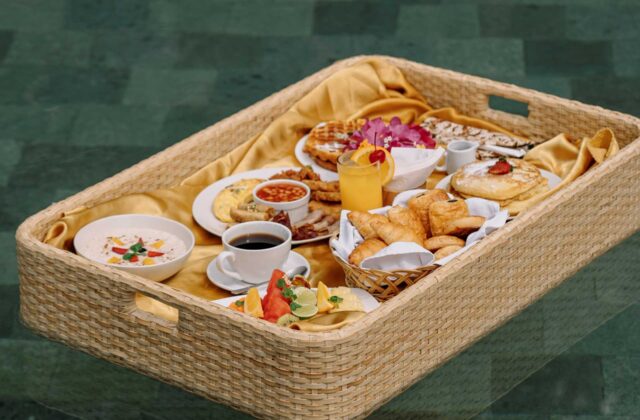 Instagrammable floating breakfast tray served in the private swimming pool at Astagina Resort.