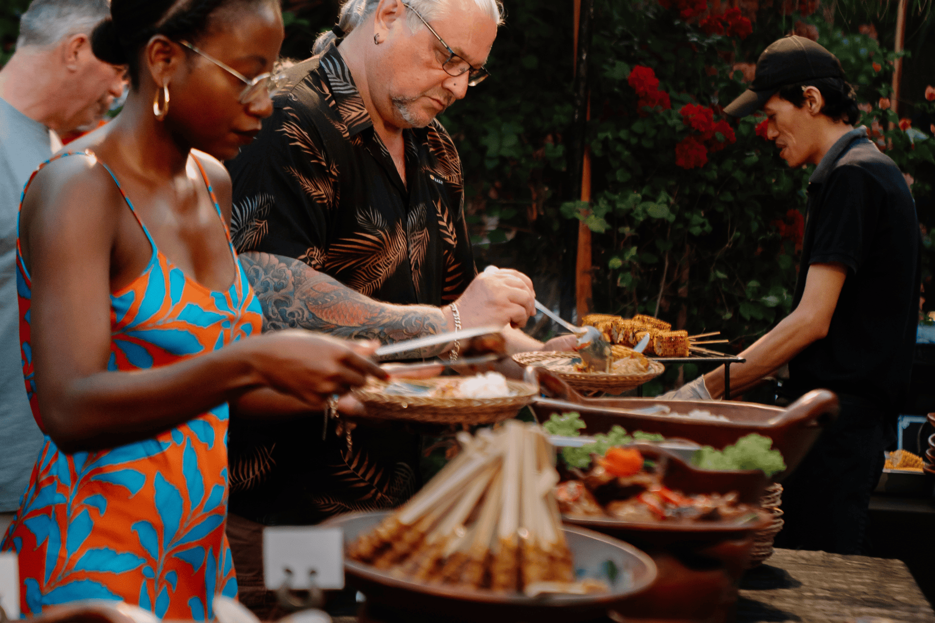 Guests savoring a delicious traditional Indonesian dining experience at Astagina Resort.