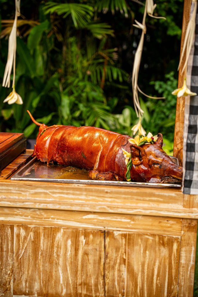 Whole Balinese Suckling Pig signature dish featured at the Balinese Night Buffet in Pangi Bistro Legian Bali