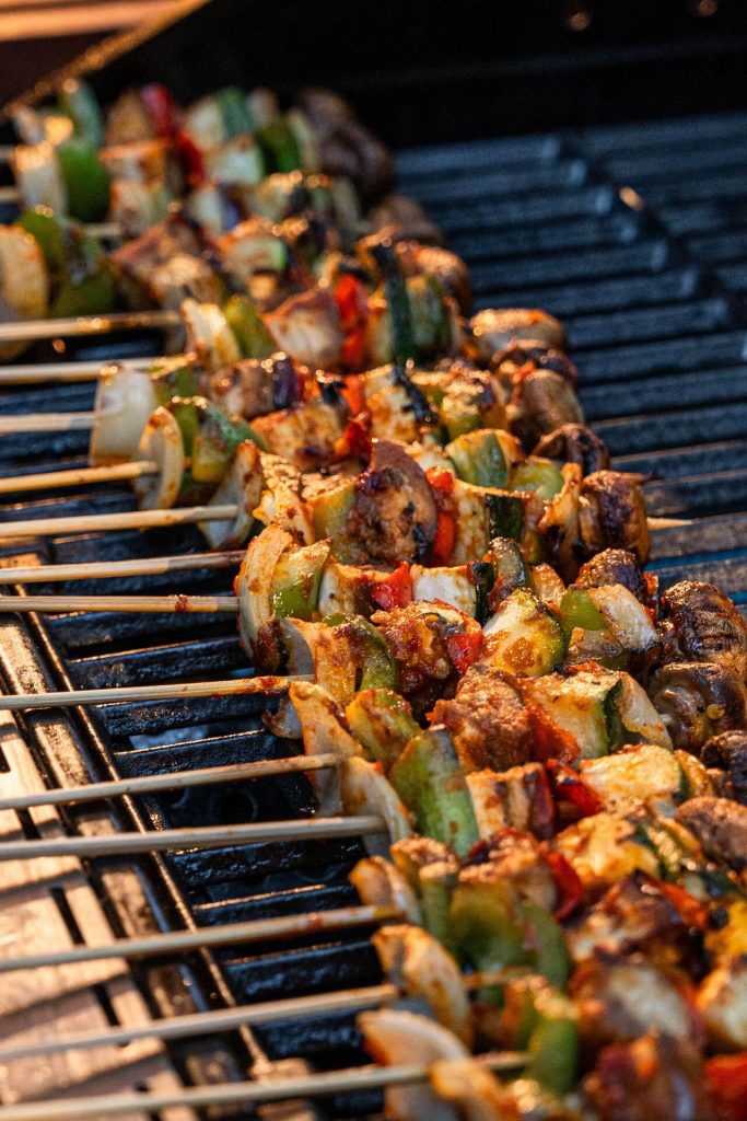 Freshly grilled chicken pineapple kebabs and skewers at the Aussie BBQ Buffet Pangi Bistro Astagina Resort Legian
