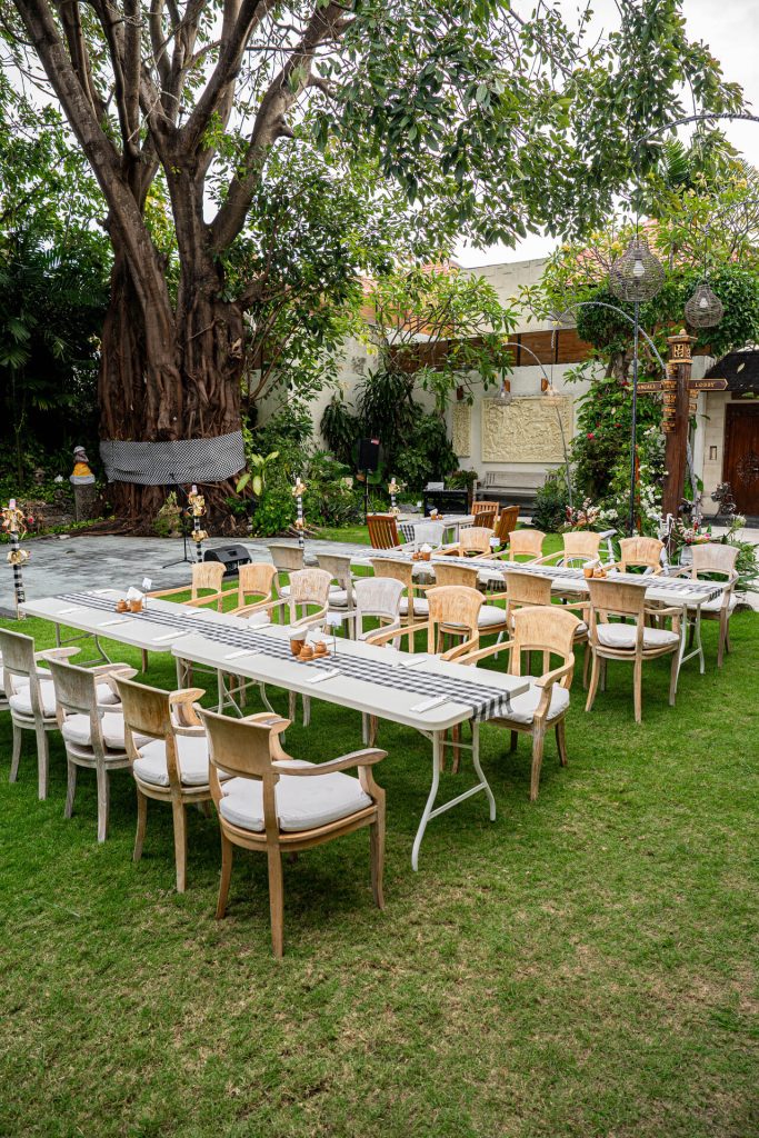 Outdoor dining setup in the Banyan Garden at Astagina Resort Legian Bali for private events and resort experiences