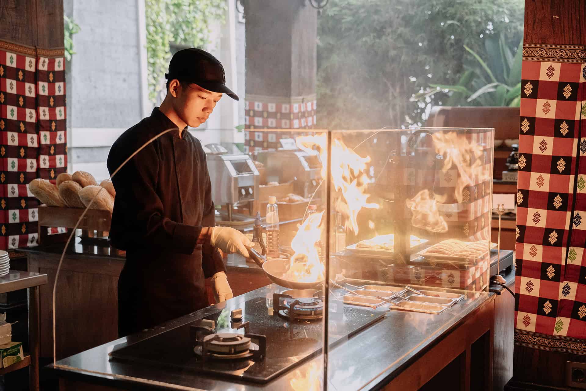 Authentic culinary experience with a chef preparing dishes at Pangi Bistro, Astagina Resort